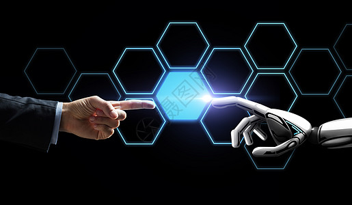 未来的技术,人工智能商业机器人人手触摸虚拟网络全息图黑色背景机器人人手触摸网络全息图图片