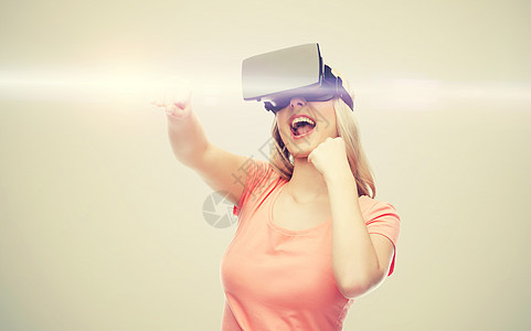 三维技术,虚拟现实,娱乐活动人们的快乐的轻女与虚拟现实耳机3D眼镜玩游戏,灰色背景激光上战斗女虚拟现实耳机图片