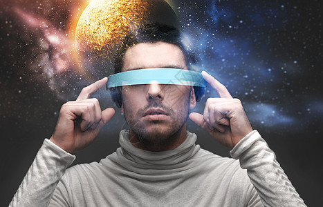 ,未来技术虚拟现实人三维眼镜上的行星恒星背景太空背景上戴3D眼镜的男人图片