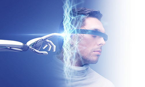 科学未来的技术机器人手连接虚拟低聚全息图男头上的蓝色背景机器人手连接虚拟网络图片