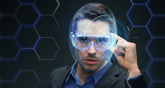 未来的技术,商业人的商人三维眼镜与虚拟全息图黑暗的背景商人三维眼镜与虚拟全息图图片