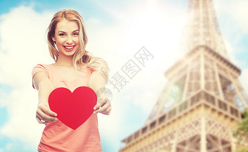 爱,浪漫,慈善,情人节人们的微笑的轻女人十几岁的女孩,空白的红色心形巴黎埃菲尔铁塔的背景红色心形的快乐女人少背景图片