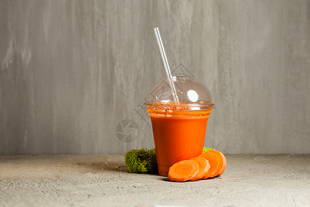 塑料杯胡萝卜汁附近新鲜蔬菜新鲜胡萝卜汁图片