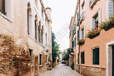 意大利旧威尼斯街道的旅游路线背景图片