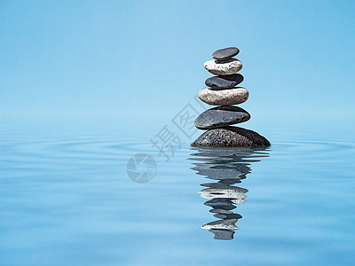 禅宗谐冥想放松平心灵的背景平衡的石头叠水中与倒影禅宗平衡石头堆叠图片