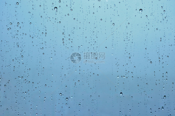 雨水滴窗户璃纹理背景上雨点落窗户上图片