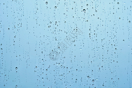 雨水滴窗户璃纹理背景上雨点落窗户上图片