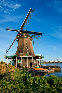 日落时,荷兰著名的旅游景点ZaanseSchans的风车Zaandam,荷兰日落时荷兰的赞斯山的风车赞丹姆,尼瑟图片