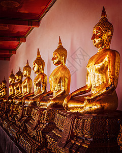 复古效果过滤了时尚风格的形象,坐佛教寺庙瓦佛,曼谷,泰国坐着佛像,泰国图片