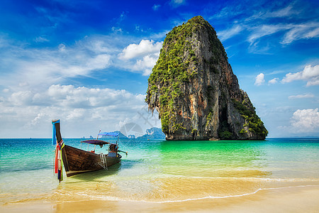 热带度假旅游海滩长尾船热带海滩,克拉比,泰国泰国海滩上的长尾船图片