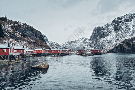 挪威峡湾的Nusfjord正宗传统渔村,冬季传统的红色Rorbu房屋挪威洛福腾群岛挪威Nusfjord渔村图片