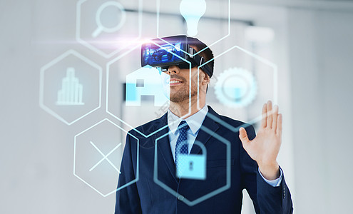 商业,技术增强现实商人与VR耳机全息菜单图标办公室办公室配备虚拟现实耳机的商人图片