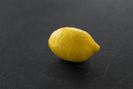 食物,健康饮食素食整个柠檬石板桌把整个柠檬放石板桌上图片