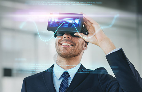 技术增强现实商人与VR耳机全息数办公室配备虚拟现实耳机的商人图片