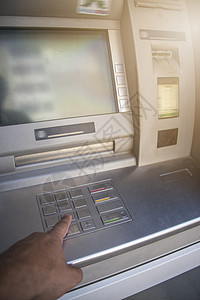 提款机ATM矗立城市的街道上图片