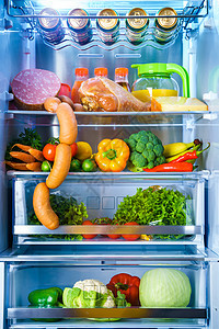 打开装满食物的冰箱图片