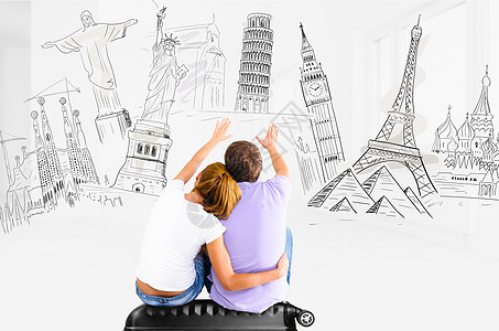 浪漫的旅行计划夫妇计划他们世界各地的旅行,并挑选地方参观坐旅行箱图片