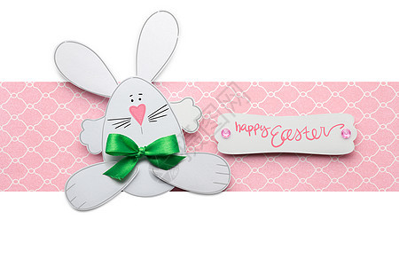 创意复活节照片的兔子的纸粉红色白色背景图片