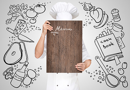 餐厅厨师个粗略的背景隐藏个木制砧板后,为个商业午餐菜单与价格图片
