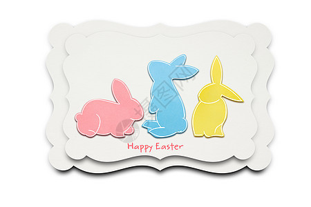 创意复活节照片的三只兔子与纸制成的白色背景图片
