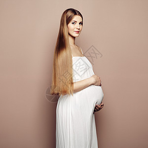 轻孕妇的肖像怀孕,爱,人期望的快乐的孕妇长发背景图片