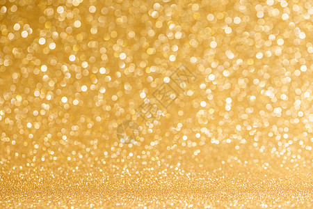 闪亮的金色灯光背景闪亮的金色波克闪光灯抽象背景,诞新派庆祝图片