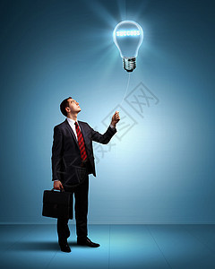 灯泡个商人商业中创造力的象征图片