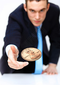 投掷硬币风险运气的象征的人图片