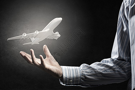 空运男手持飞机模型背景图片