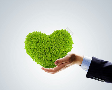 绿色植物人类手的形象,植物形状像心脏环境保护图片