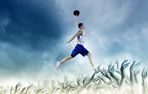 篮球运动员轻人篮球运动员手球跳得很高图片