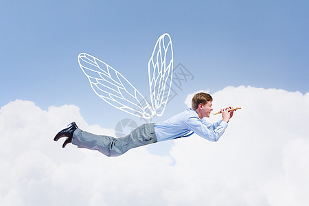 商人飞得很高轻的商人,长着翅膀天空中飞翔图片素材