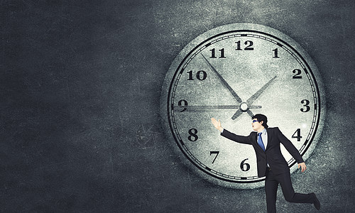 跑步侧面时间的与趣的商人跑得匆忙背景