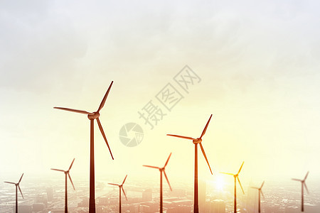 日落背景下的风车替代电力的替代风能图片