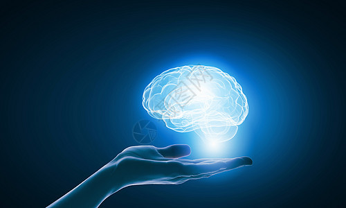 心理健康商人持数字图像的大脑手掌图片