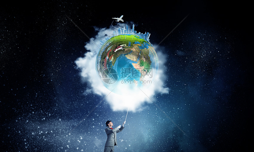 世界他手里商人用绳子抓住地球行星这幅图像的元素由美国宇航局提供的