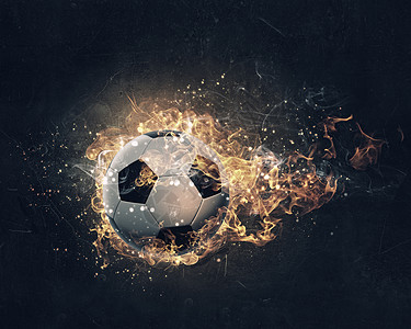 球火中燃烧足球火焰黑暗的背景下火焰图片