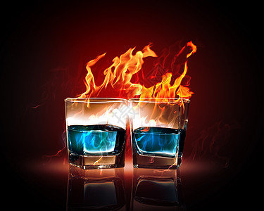 两杯燃烧的翡翠苦艾酒两杯燃烧的翡翠苦艾酒的图像图片