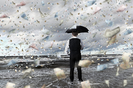 钱点在钞票雨中的男性背景
