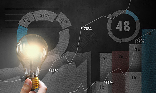 金融增长的想法男手握灯泡图表图表的背景上背景图片
