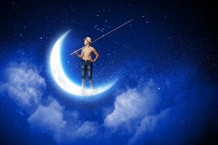 小渔夫小男孩着钓鱼竿站月亮上图片