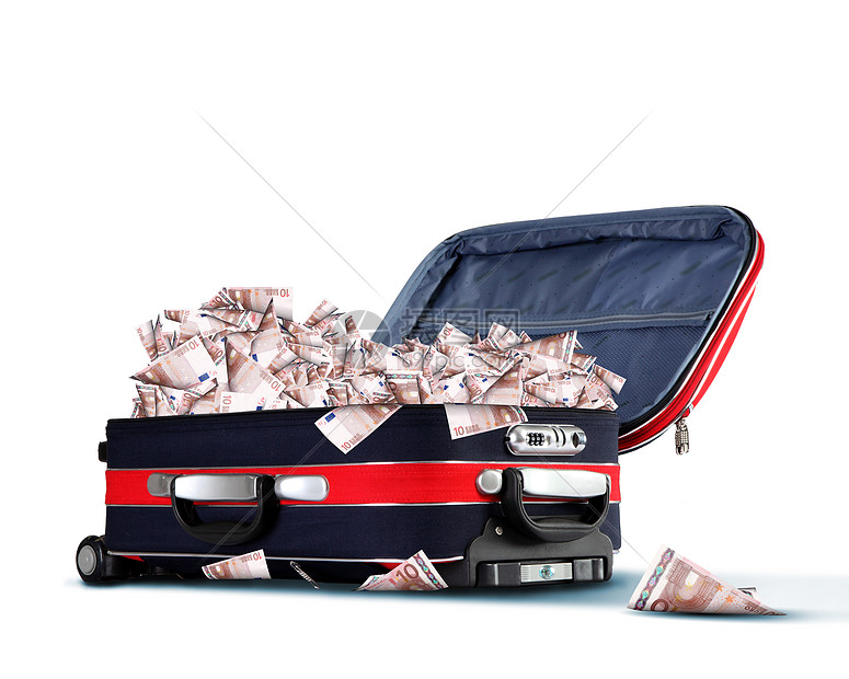 红色旅行箱装满钞票的照片图片