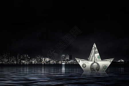 美元船水里用美元钞票制成的船浮水里图片