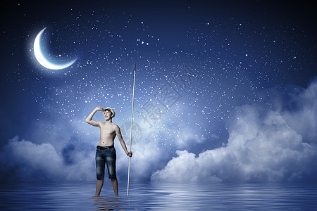 户外钓鱼小渔夫晚上带着鱼竿的小男孩设计图片