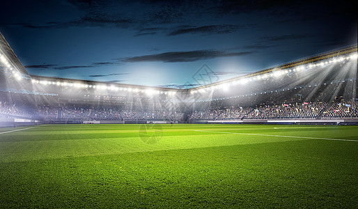 灯光下的足球场空的背景图像图片