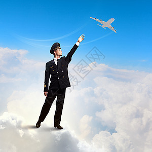 飞行员触摸空气的图像飞行员飞机背景下触摸天空的图像图片