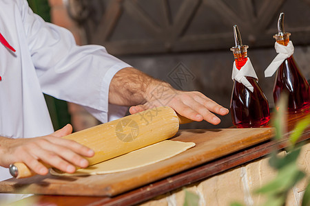 厨师手的特写烹饪手擀的特写图像图片