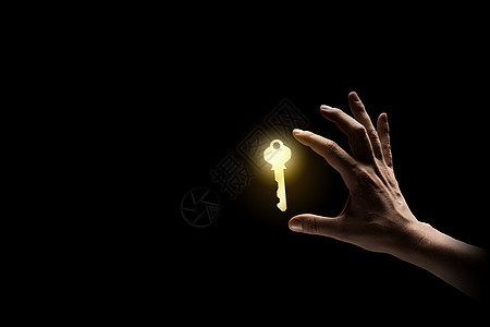钥匙手特写商业人士持闪亮钥匙的形象图片