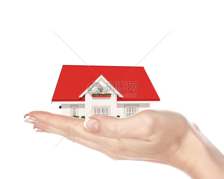 人类手中彩色屋顶的房子图片