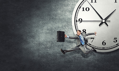 这生意的好时机时间的与趣的商人跑得匆忙图片素材